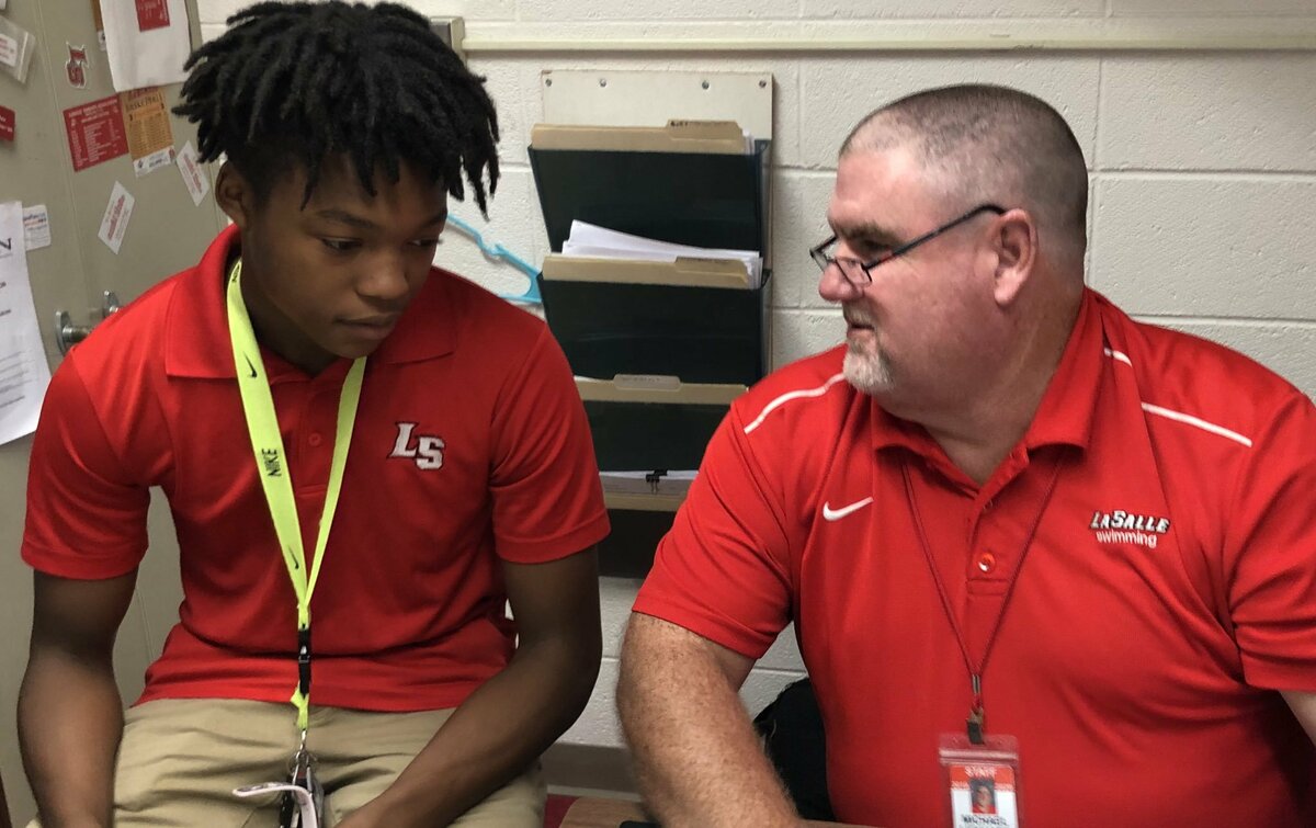 student and teacher meeting